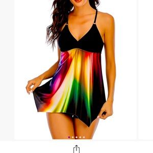 Tankini top with black swim shorts